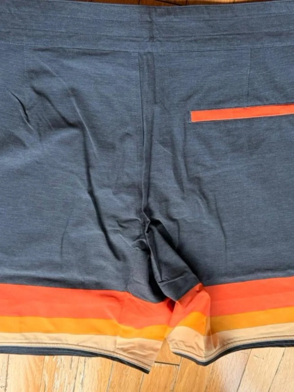 United By Blue Navy Swim Board Shorts with Orange Stripe Accents
